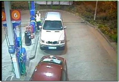 Petrol Station CCTV showing how not to cover the pumps. The image is too wide so has no detail of the number plates.